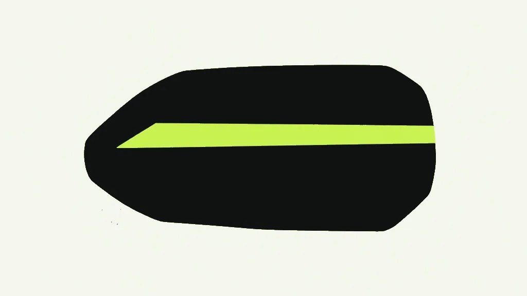 A dark angular slab with a single bright stripe cut clean across its worn surface