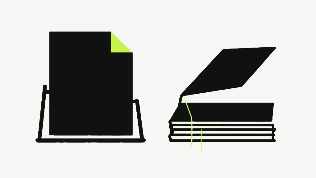 A dark sheet standing upright on a stand, beside an opened flat unit lying next to it